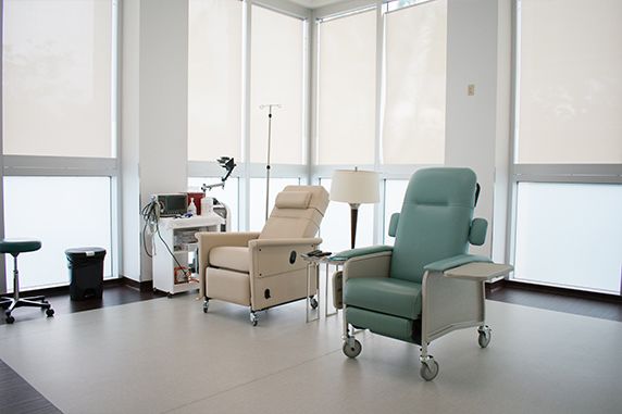 White room with medical stands