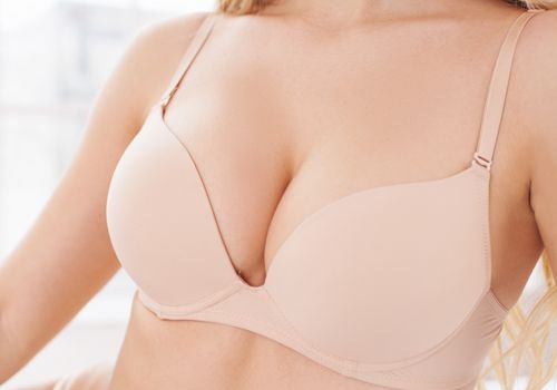 Woman representing breast implants in naples fl